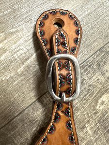 Hand tooled and painted spur straps