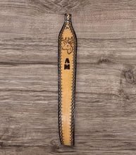 Hand tooled sling