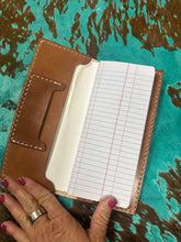 Hand tooled tally book