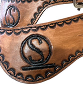 Hand tooled and painted Custom Brand spur straps