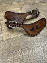 Hand tooled and painted custom spur straps brown and black