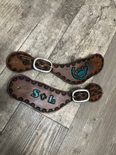 Custom Hand tooled and painted brand spur straps