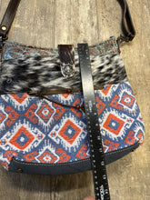 Cowhide, Tapestry and leather shoulder bag with leather strap