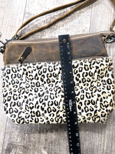 cowhide  and leather cheetah cross body  bag with leather strap
