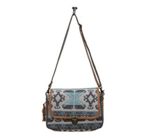 Tapestry and leather shoulder  bag with leather strap