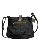 Myra  turquoise and black cowhide leather hand bag with tooled leather.
