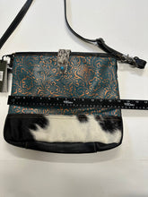 Myra  turquoise and black cowhide leather hand bag with tooled leather.