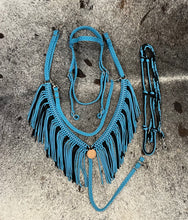 horse tack set,  (fringe breast collar, wither strap, reins, and bridle)