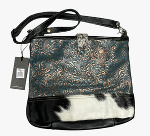 Myra  turquoise and black cowhide leather hand bag with tooled leather.